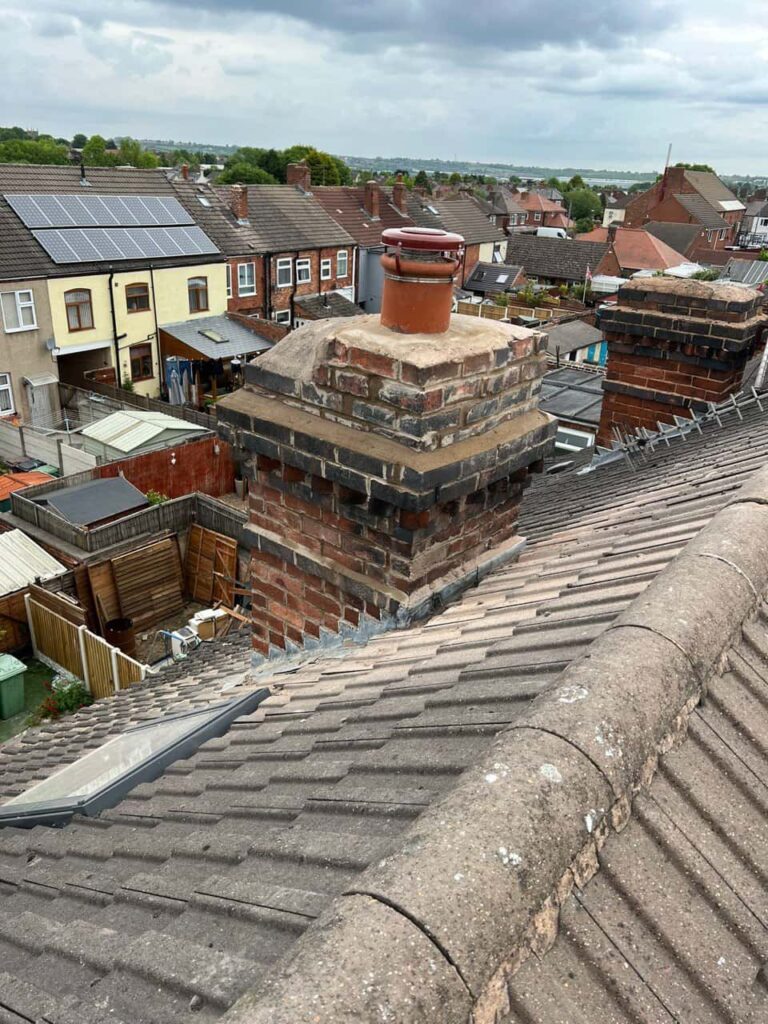 This is a photo taken from a roof which is being repaired by Warlingham Roofing Repairs, it shows a street of houses, and their roofs