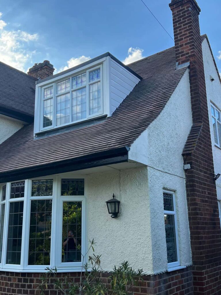 This is a photo of a dormer window which has just had some repairs carried out where the roof and the dormer meet. Works carried out by Warlingham Roofing Repairs